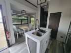 Thumbnail Photo 2 for New 2023 Forest River Cedar Creek